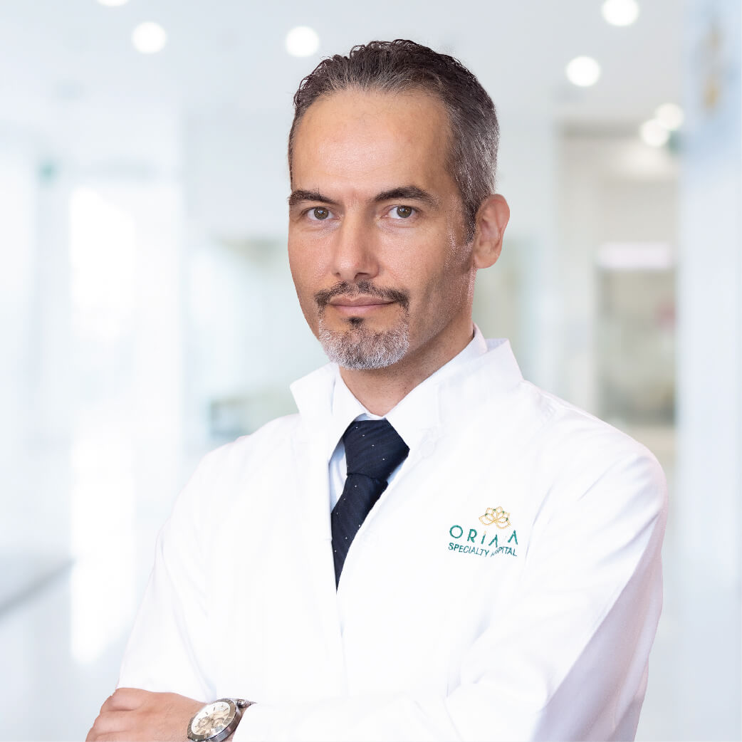 DR. OMAR HENEIDI